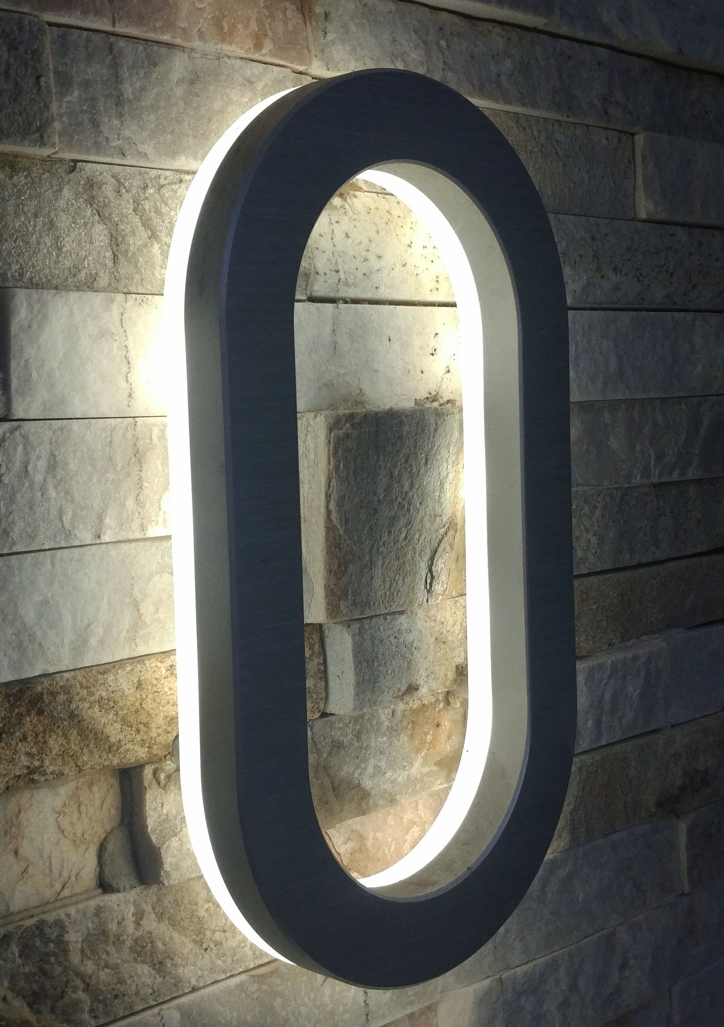 Backlit door numbers, made to order. Select your size, color, font and power sources.