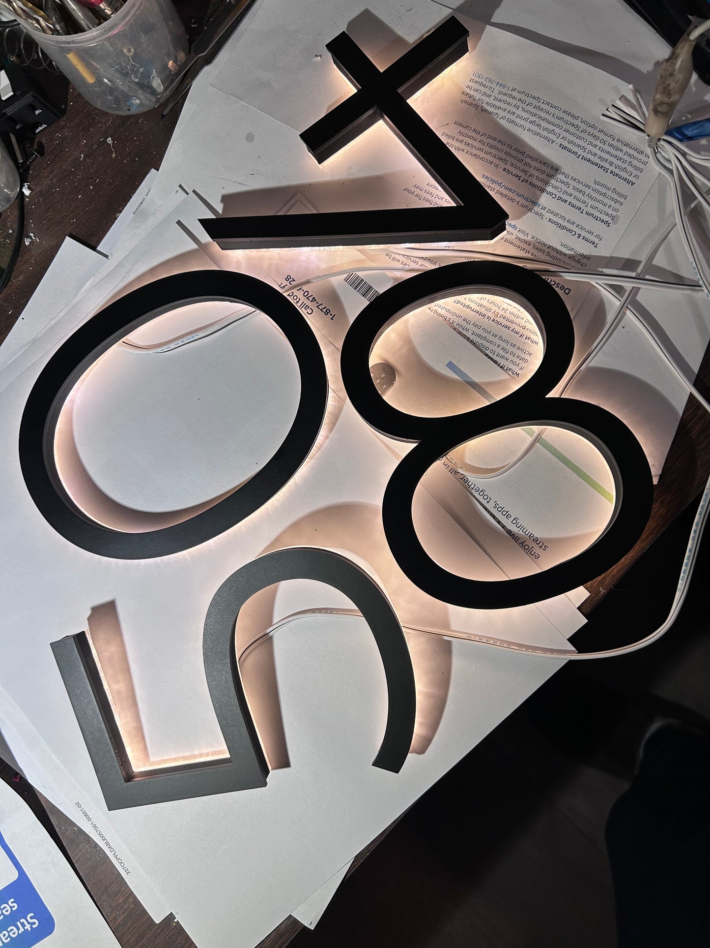 Backlit door numbers, made to order. Select your size, color, font and power sources.
